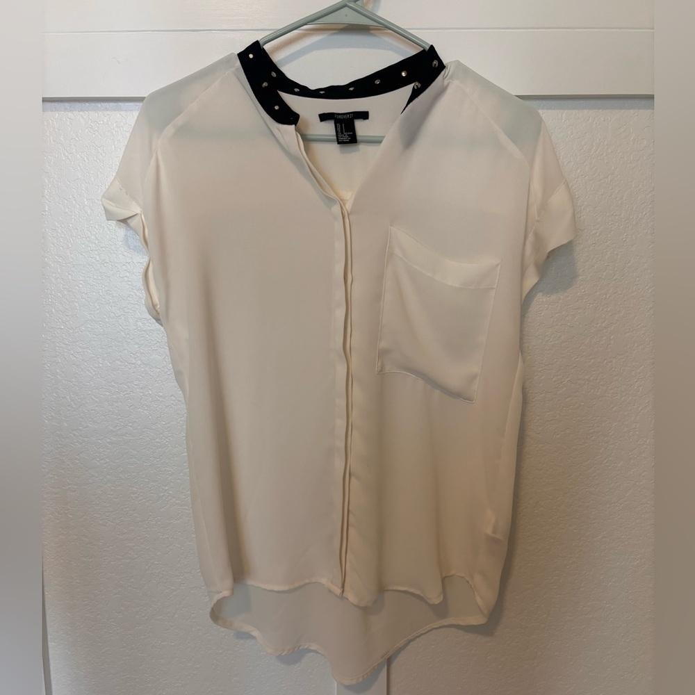 Forever 21 women’s size m, button up top.